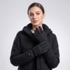 Woman wearing Ololar Flex Series Heated Gloves in cold conditions